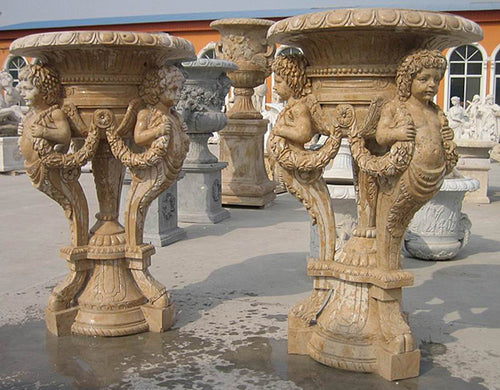 Roman Urns with Cherub Caryatid Pedestals Pair