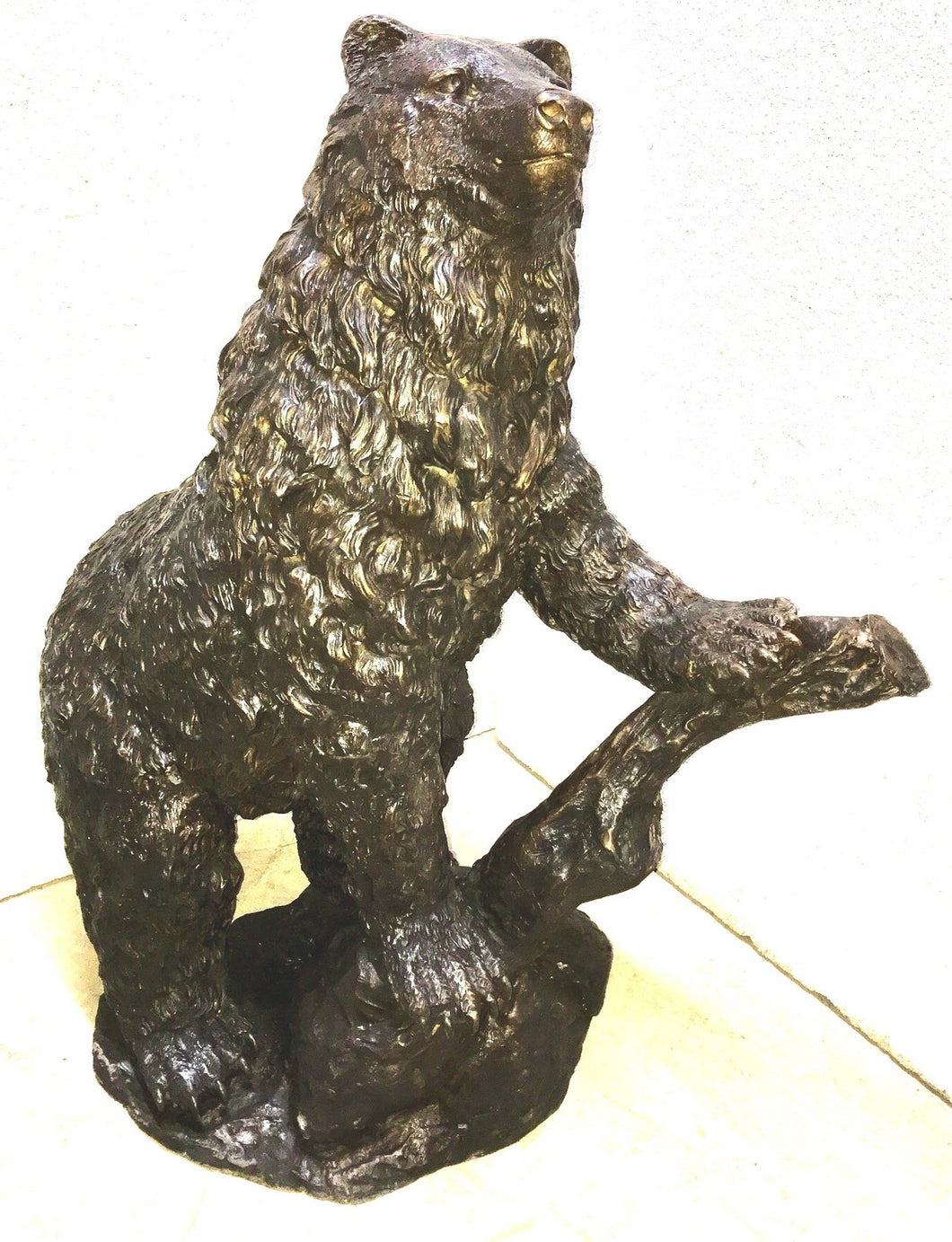 Watchful Bronze Bear Sculpture Climbing a Tree