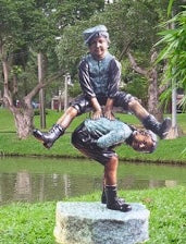Two Boys Doing Leapfrog Bronze Sculpture