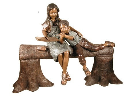 Bronze Boy and Girl with Book on a Log Statue