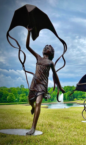 Bronze Girl Flying a Kite Sculpture