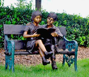 Bronze Reading Boy and Girl on a Bench Sculpture