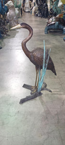 Bronze Heron Sculpture by a Cattail