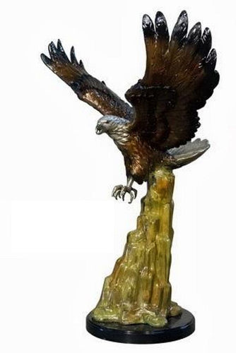 Eagle Descending from Cliff