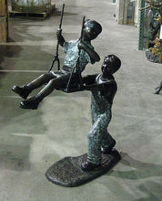Load image into Gallery viewer, Boy Pushing Girl on Swing Statue