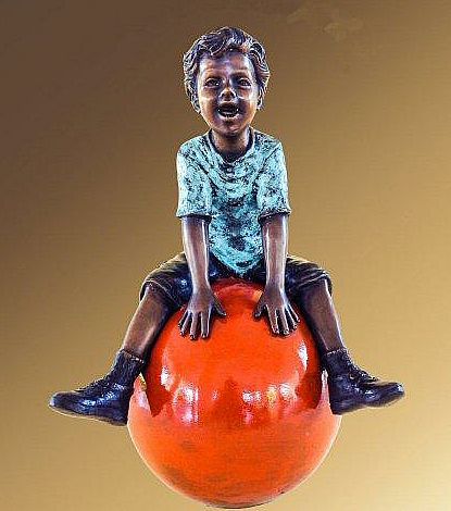 Happy Boy on Ball Statue