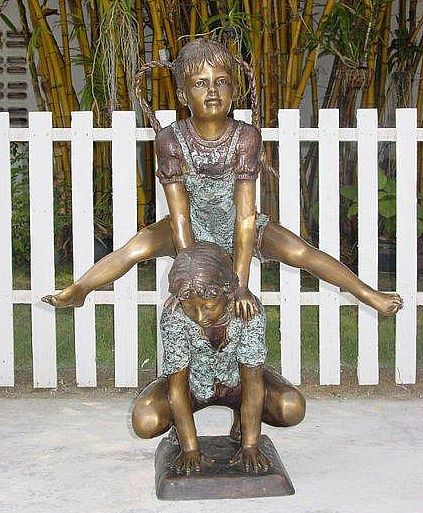 Boy and Girl Doing Leapfrog Garden Sculpture