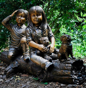 Two Children on a Tree Log Bronze Sculpture